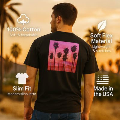 Man wearing a black t-shirt with palm tree design, standing against a sunset beach backdrop.